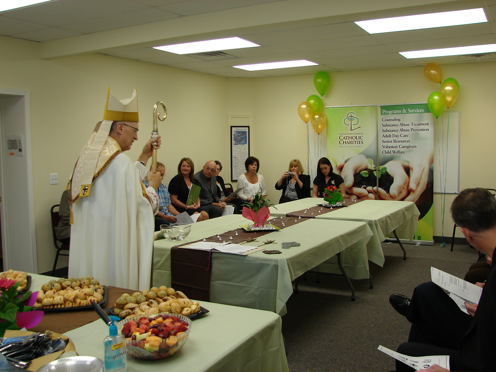Bishop blesses Catholic Charities office expansion